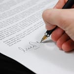 Ubuntu Code of Conduct ondertekend sign pen business document