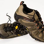 brown and black merrell hiking shoes