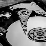 silver and black hard disk drive