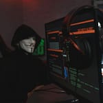 🎣 The Curious Case of the Beg Bounty Bait — or: Licence to Phish person in black hoodie hacking a computer system